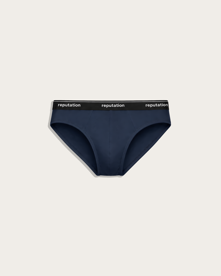 Reputation Signature Brief 01 in midnight blue, flat lay