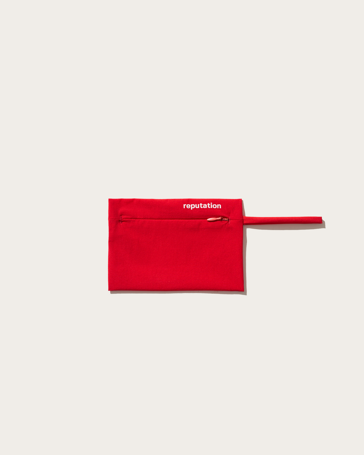 Reputation red swimwear packaging pouch, flat lay