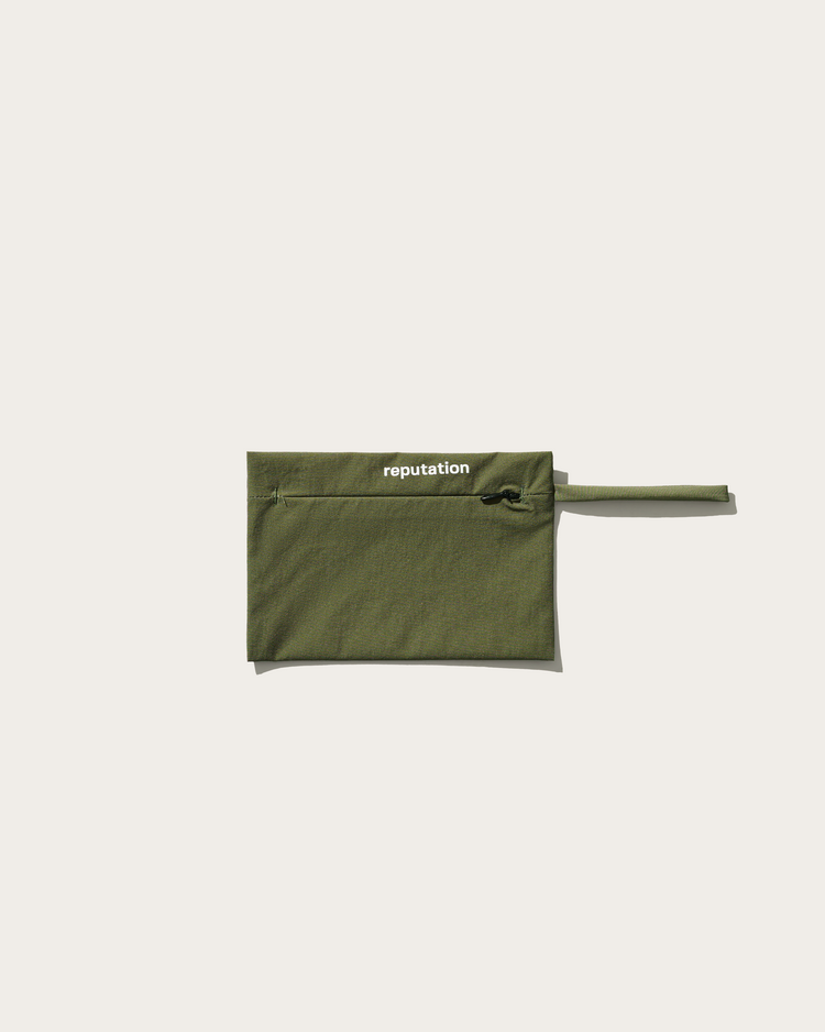 Reputation olive green swimwear packaging pouch, flat lay