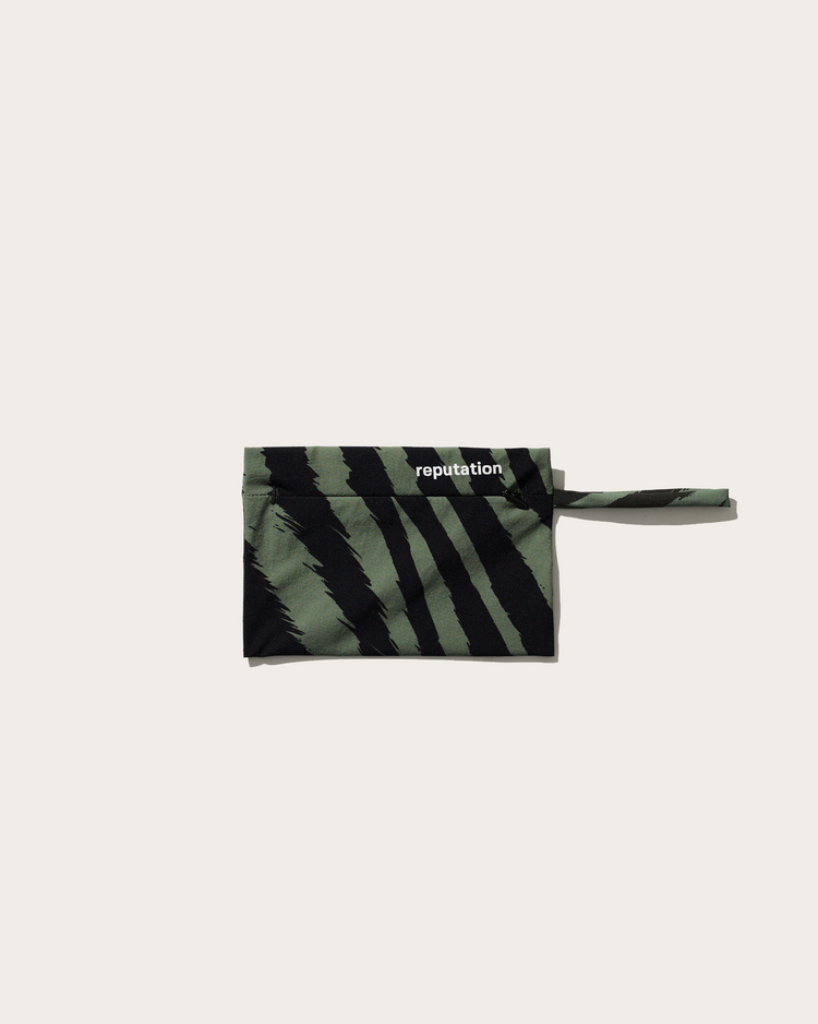 Reputation olive green zebra swimwear packaging pouch, flat lay